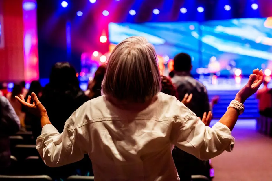 Hands raised in worship at Sunday service