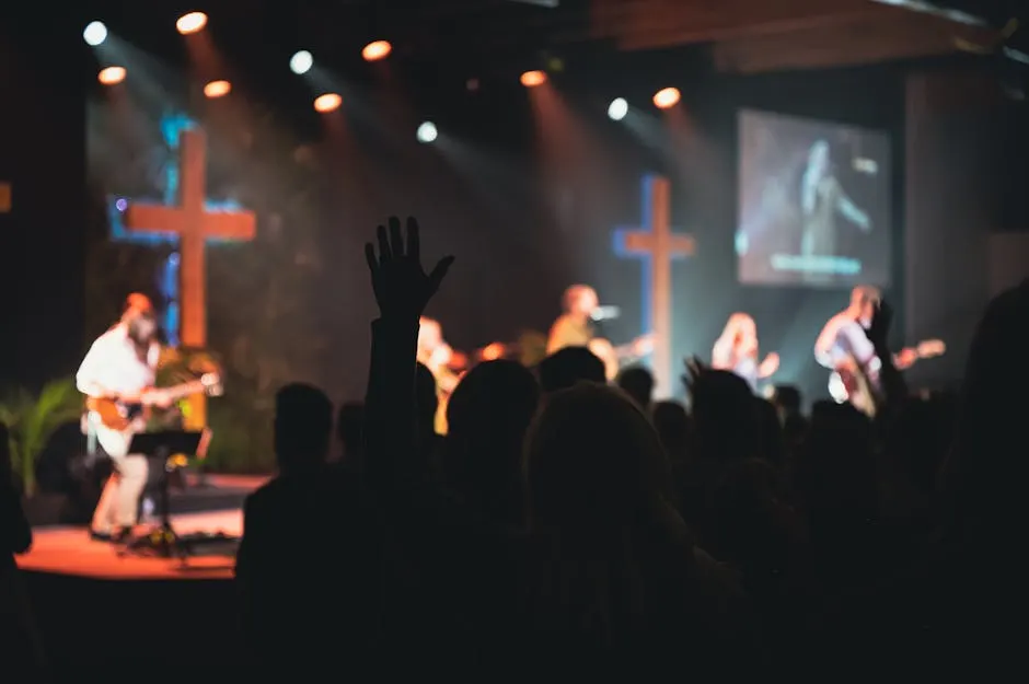 Congregation worshipping in soft light