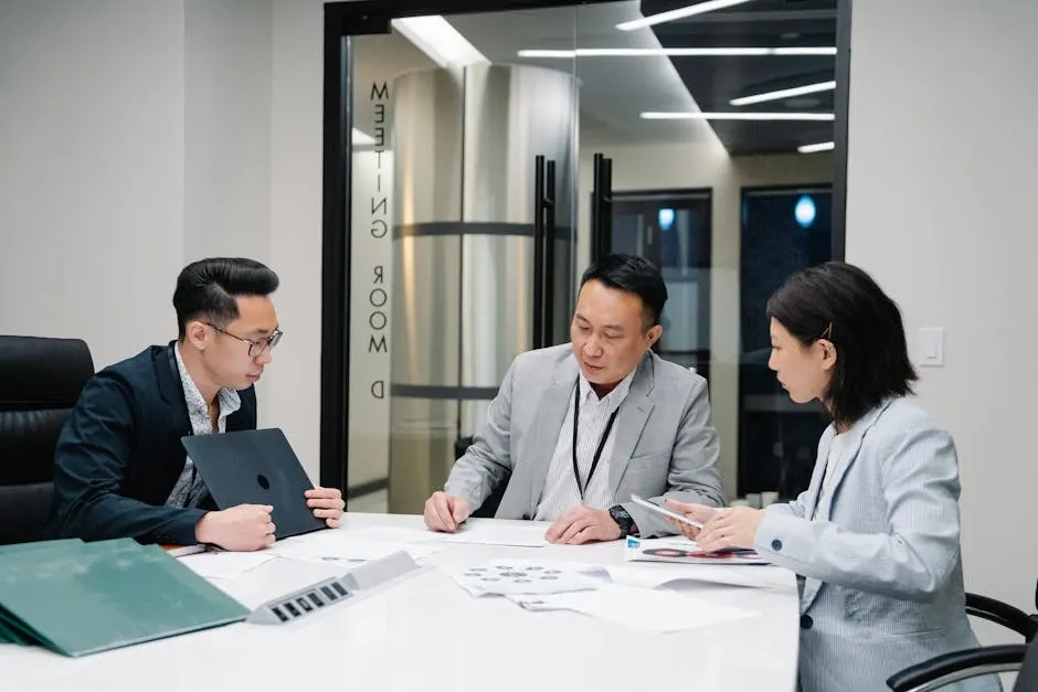 Modern Business partners in a strategy meeting with a client