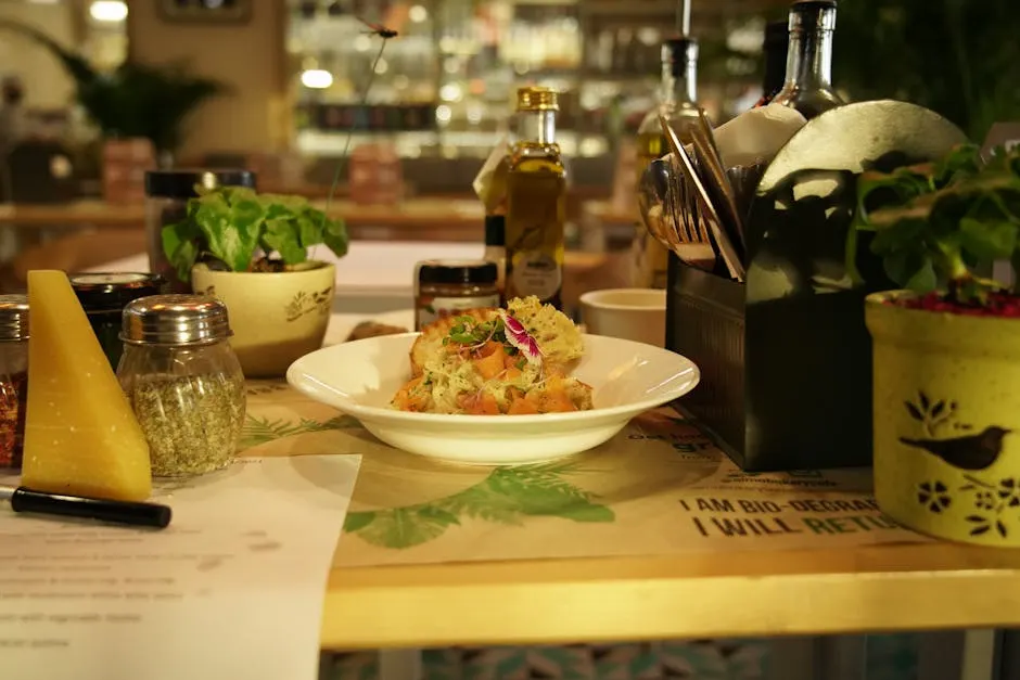 A signature pasta dish with seasonal herbs, plated and ready to serve